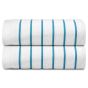 Two aqua blue pool towels stack on top of each other. 