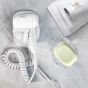 The hair dryer on a marble table.
