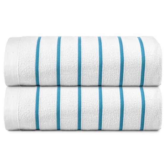 Two aqua blue pool towels stack on top of each other. 
